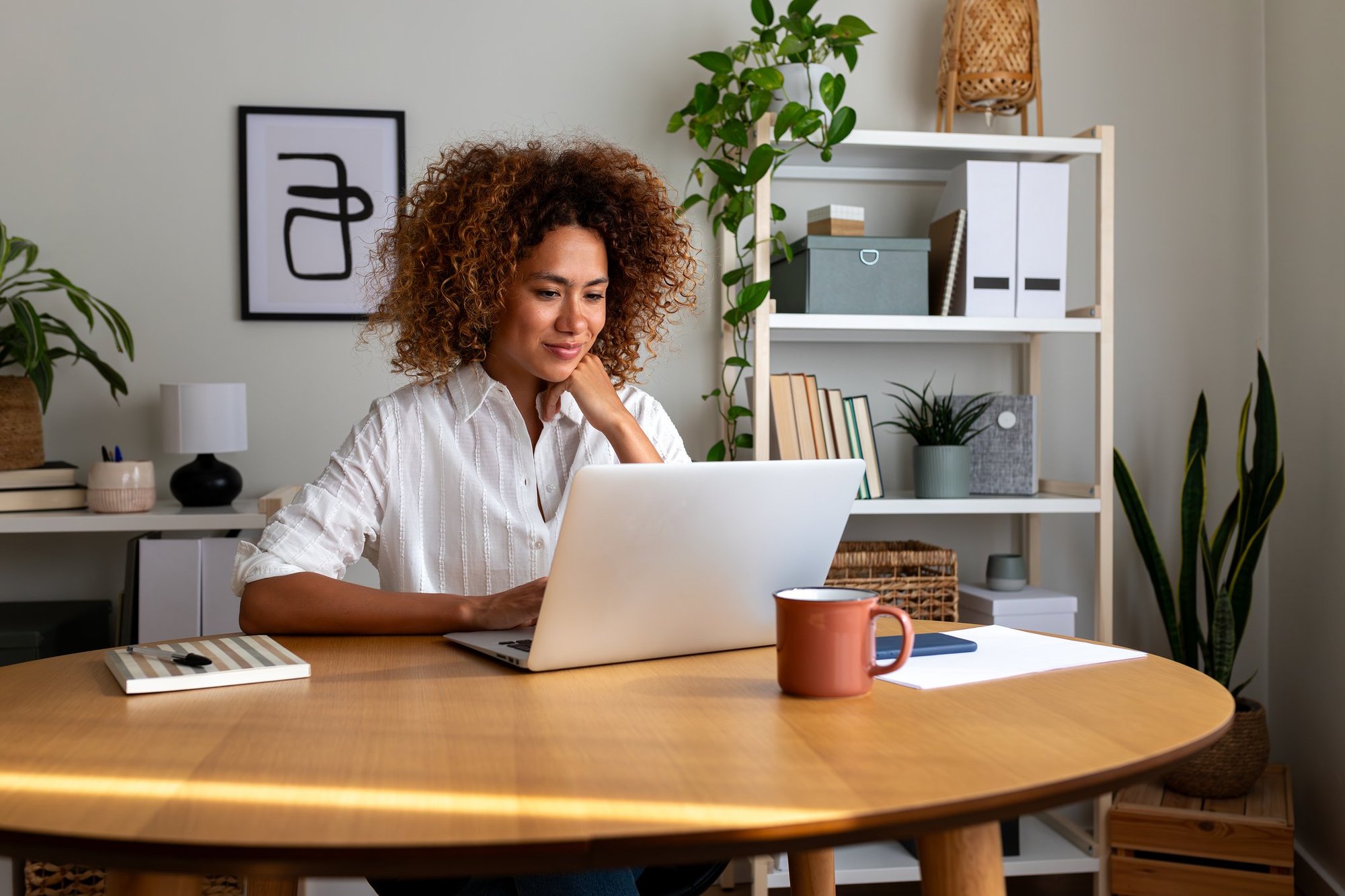 A woman reviews translation security information on her laptop.