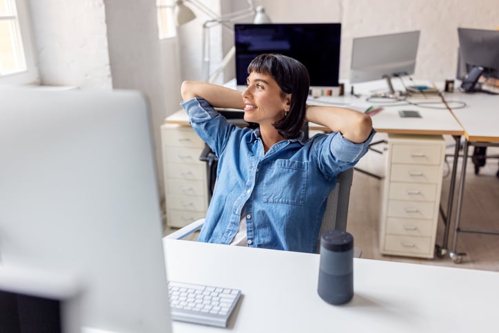 A woman relaxes as LanguageLine automates the localization for her website.