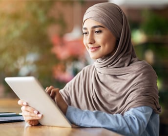 A woman shops using a localized website